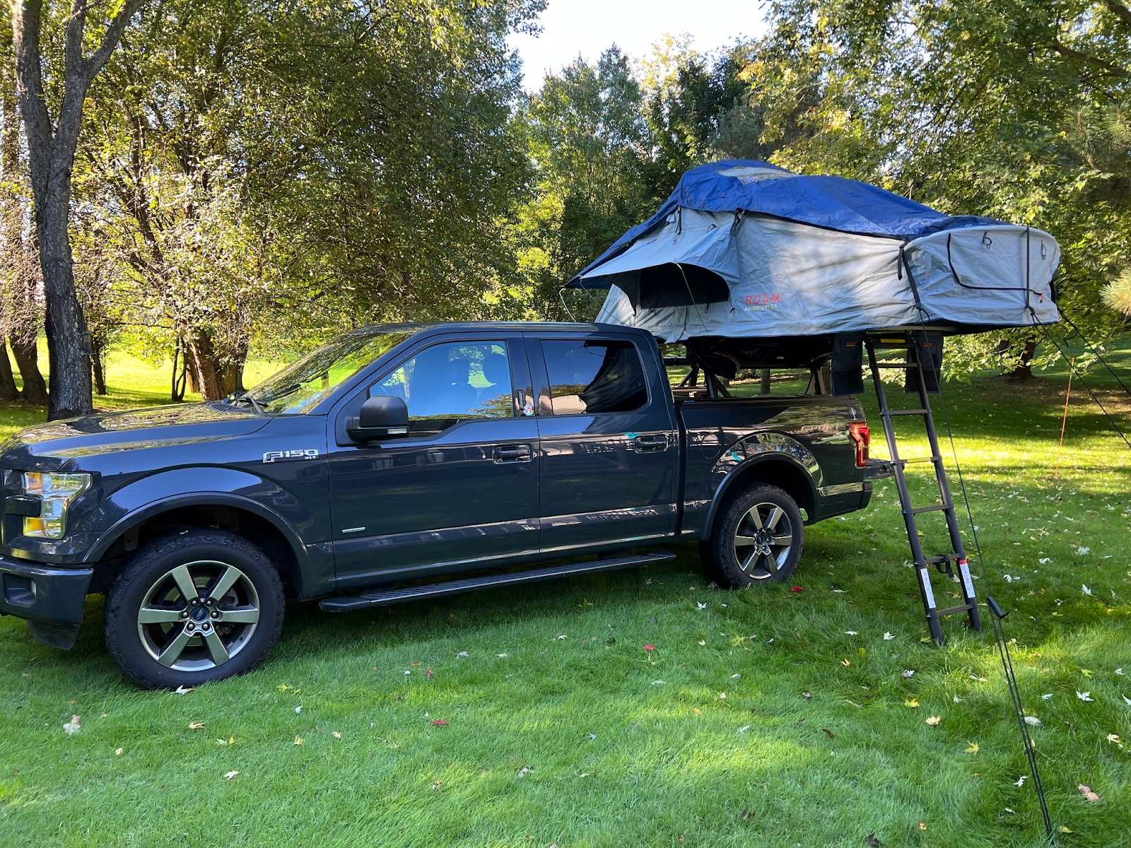 Ford F150 pickup with a rooftop tent on a bed rack